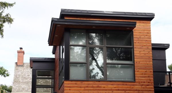 Detail of cedar soffit and steel tie-rod